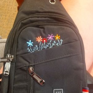 Embroidered cross body bag